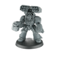 Unpainted Terminator with cyclone missile launcher and storm bolter, magnetized for swaps, on a 40mm base