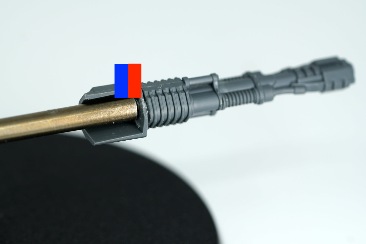 Twin Iliastus Accelerator Fusil with a 4mm bit pressing its 3mm x 2mm magnet flush